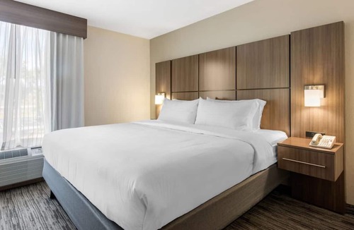 Tropic Hotel | Chic Florida Retreat! Near Brevard Zoo & The Avenue Viera | Free Parking | Pool