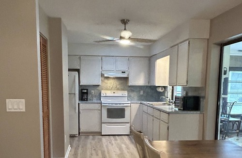 Bonita Springs House | Close to beaches and downtown located on a quiet street with a canal and dock.