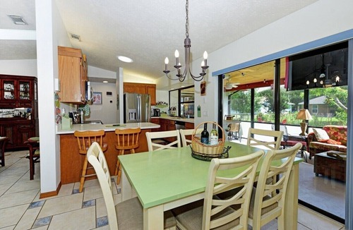 Indian River Estates House | Coastal Comfort Retreat - Pet-Friendly Paradise w/Fenced Yard, Fire Pit & Lanai
