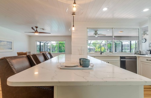 Shell Harbor House | Coastal Cottage on Canal, East End with Pool