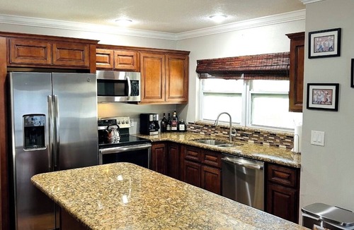 Seminole House | Coastal Oasis 4BR/3BA | Sleeps 8 | Heated Pool | 3-Min Drive to Beach