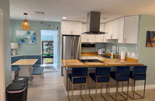 Stuart House | Coastal Orchid Hideaway: Stylish 2BR 2BA near beaches, dining, fenced yard.