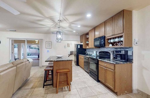 Englewood Condo | Coastal retreat steps to the beach with screened lanai and bikes