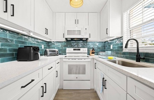 Dunedin Condo | Colorful Coastal Retreat Near Honeymoon Island Beaches