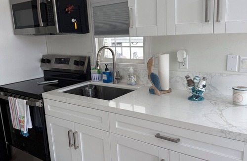 Key Largo Cottage | Coral Dolphin Cottage- Waterfront tiny home getaway in Key Largo