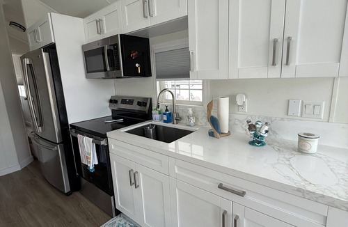 Key Largo Cottage | Coral Dolphin Cottage- Waterfront tiny home getaway in Key Largo