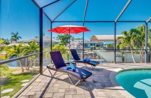 Yacht Club Villa | CoralVilla Felicity - pool, spa, river access, Tiki Hut