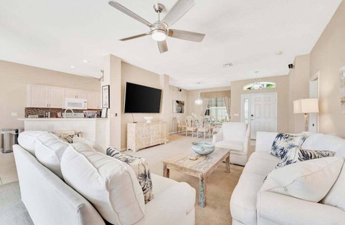 Herons Glen House | Country club retreat with private pool, water views, on-site golf, & gym