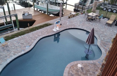 Fort Myers Shores House | Couples Retreat upstairs suite off the Caloosahtchee River with private pool