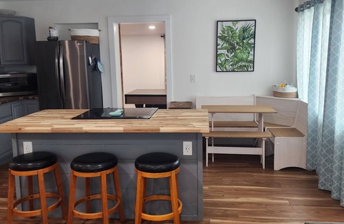 Palm City House | Cozy 3 bedroom home, walking distance to The Patio and restaurants in Palm City.