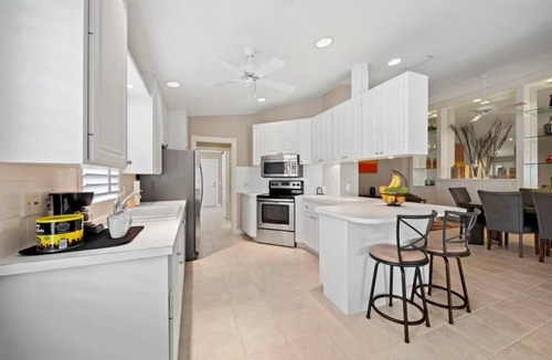 Village Walk House | Cozy beach home in vibrant neighborhood with Pickleball courts & Restaurant Home