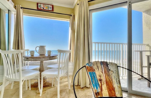 Belleair Beach Condo | Cozy Beachfront Retreat right on the Sand, Sparkling Pool, & Charming Coastal Flair!