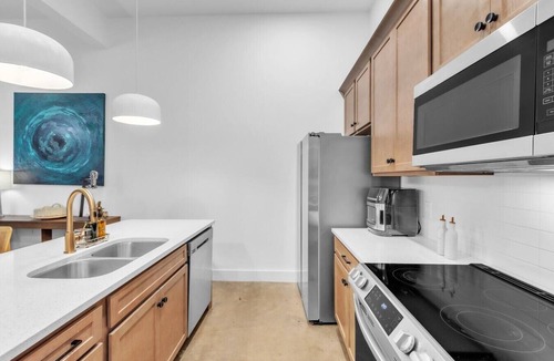 Spartanburg Apartment | cozy high ceiling hub of colors