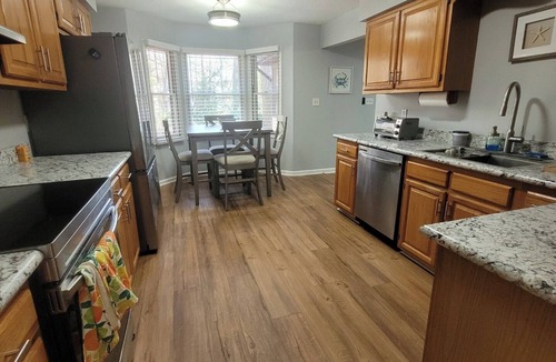 Ocean Pines House | Cozy home featuring a screened-in porch and access to a refreshing pool. Your oasis awaits!