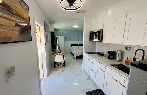 Seminole Apartment | Cozy Private Studio with Hot Tub and Workspace Near Gulf Beaches