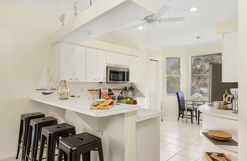 Central Naples House | Designer Lakefront Haven ‘