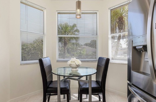 Central Naples House | Designer Lakefront Haven ‘