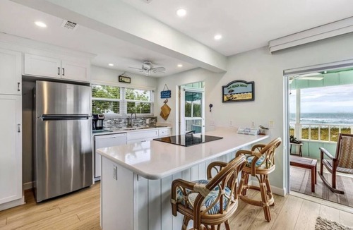 Englewood Condo | DIRECTLY ON PRIVATE BEACH! AMAZING PANORAMIC GULF VIEWS! MODERN, COZY CONDO