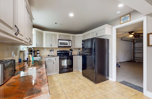 Indialantic House | Dreamy duplex with dog-friendly fenced yard, private outdoor living, AC, & W/D