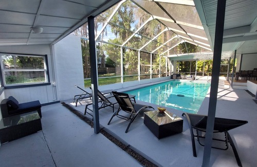 Lake Magdalene House | Elegant Snowbird Stay Renovated Lutz Villa with Heated Pool & Canal