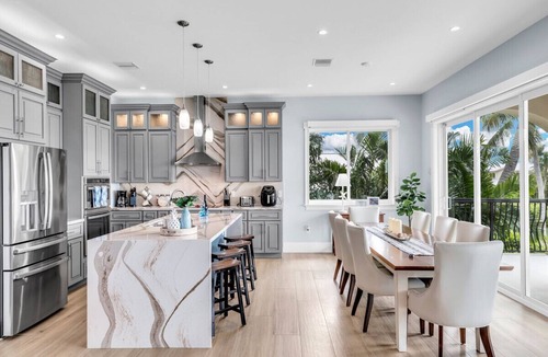 Key Colony Beach House | Elev 5BR/8BA Game Room 75’ Deep Canal Dock Ice Maker Kayaks Bikes