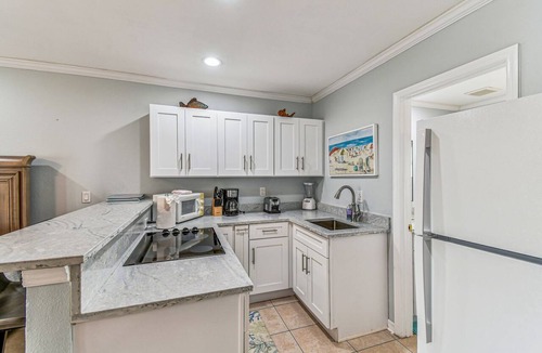 Bay Esplanade Apartment | Enchanted Inn Suite #3: Waterfront, Pool, Fishing Dock, Boat Docks & Tiki Bar!