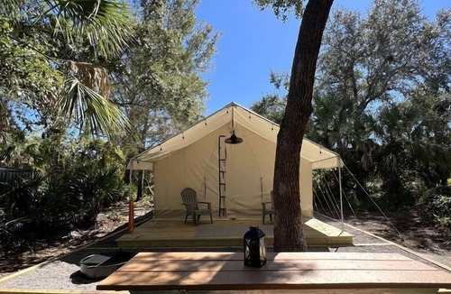 Osprey RV Rental | Enjoyable Secluded Tented Cabin with Fire Pit in Sarasota, Florida