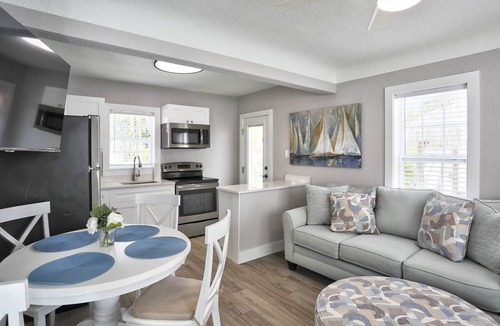 Madeira Beach Condo | Entire Island Paradise Cottages – Heated Pool, Tiki Hut, Walk to Beach, 8 Units, Sleeps 30