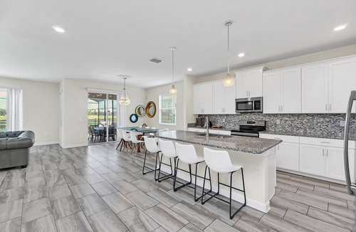 Kissimmee Villa | EV 4795 - 6 Bed 5 Bath Villa with Screened-In Pool with Spillover Spa, Games Ro
