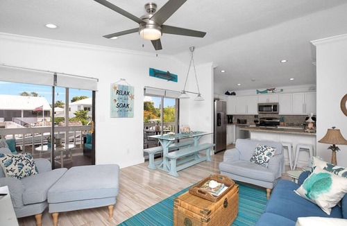 Sunshine Estates House | Experience the relaxing vibe at Heavens Reel, a spacious 3-bedroom canal home in Tavernier.