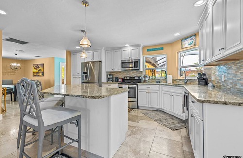 Biggar House | FABULOUS WHISKEY CREEK POOL HOUSE! SLEEPS 8! MINUTES TO GOLF AND GULF!