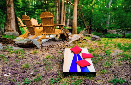East Stroudsburg Ski Chalet | Family Pocono Retreat Stream Pool Firepit AC WiFi