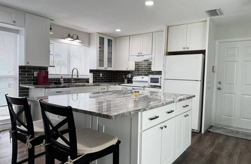 Yacht Club House | FENCED YARD 3-bed 2-bathroom Gulf Access house w/NEW HOT TUB, Dock, AC & WiFi,