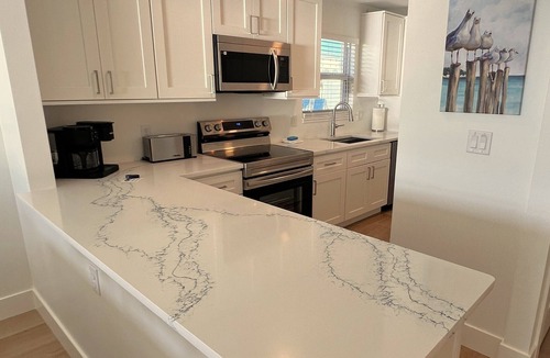 Siesta Key Condo | Fishermans Cove B101, Ground floor on the beach and next to the community pool!