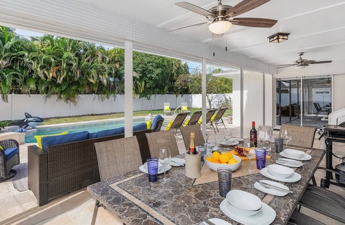 Palm River Estates House | Flaming Vine Retreat. Beach*Pool*Dine*Relax*Repeat!