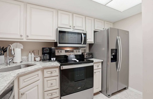 Park Shore Condo | G-144 - First Floor - End Unit With Lake Views!