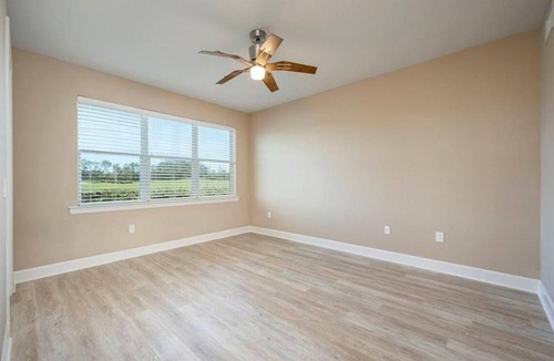 Naples House | Golf/Lake View 2 Bed+Den Coach Home In Amenity Rich Community, the Quarry!