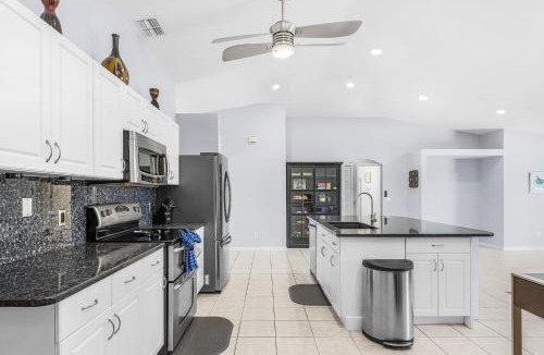 Fort Myers House | Gorgeous 4 Bedroom Waterfront Home with Private Pool and Large Kitchen