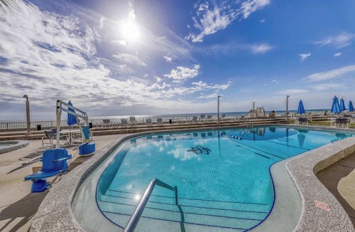 Fort Bay Condo | Gorgeous beachfront condo with shared pool, hot tub and beach access