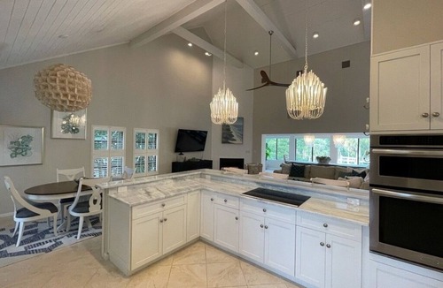 Sanibel House | Gorgeous canal front home east end Sanibel. Walk to beach, restaurants, biking.