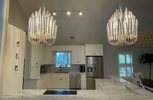 Sanibel House | Gorgeous canal front home east end Sanibel. Walk to beach, restaurants, biking.