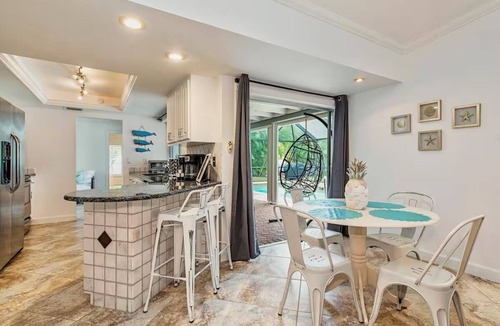 Palm River Estates House | Gorgeous Heated Pool and Hot Tub Home!
