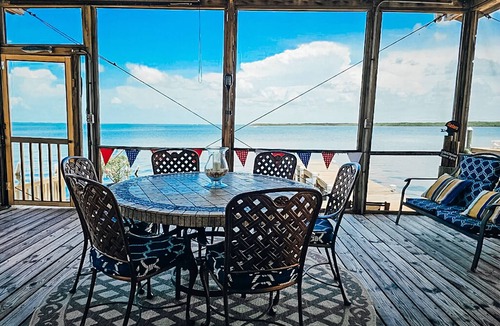 Rock Harbor House | Gorgeous Open Water Views & Nightly Sunsets On The Bay