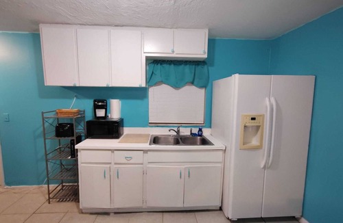 Pine Manor House | GpL 5542 Getaway with bright colors & full kitchen