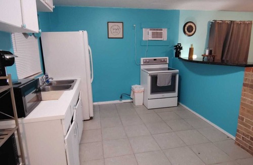 Pine Manor House | GpL 5542 Getaway with bright colors & full kitchen