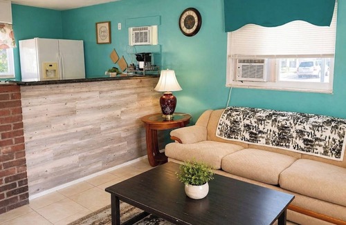 Pine Manor House | GpL 5542 Getaway with bright colors & full kitchen