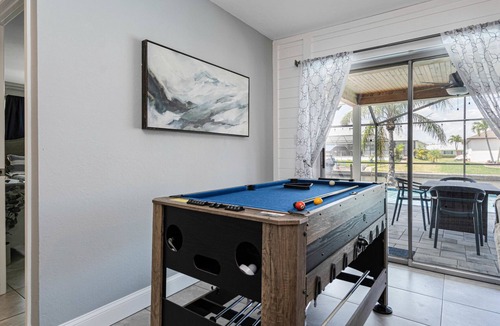 Caloosahatchee House | Gulf access pet friendly waterfront oasis with NEW heated salt water pool & spa