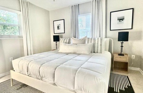 Palm Beach Shores Apartment | Haven - Walk to the Beach, Free Bikes, and Pool!