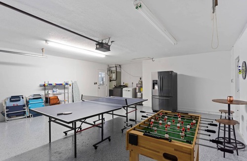 Palma Sola House | Heated Pool+Waterfall, Party Hut & Game Room