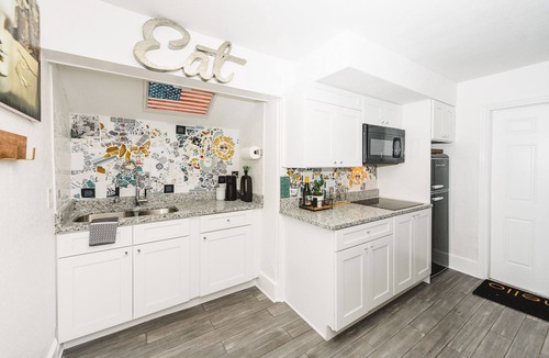 Historic Uptown House | Hello Dali Our Playful Art-Inspired Upstairs Apartment Near Downtown Walkable